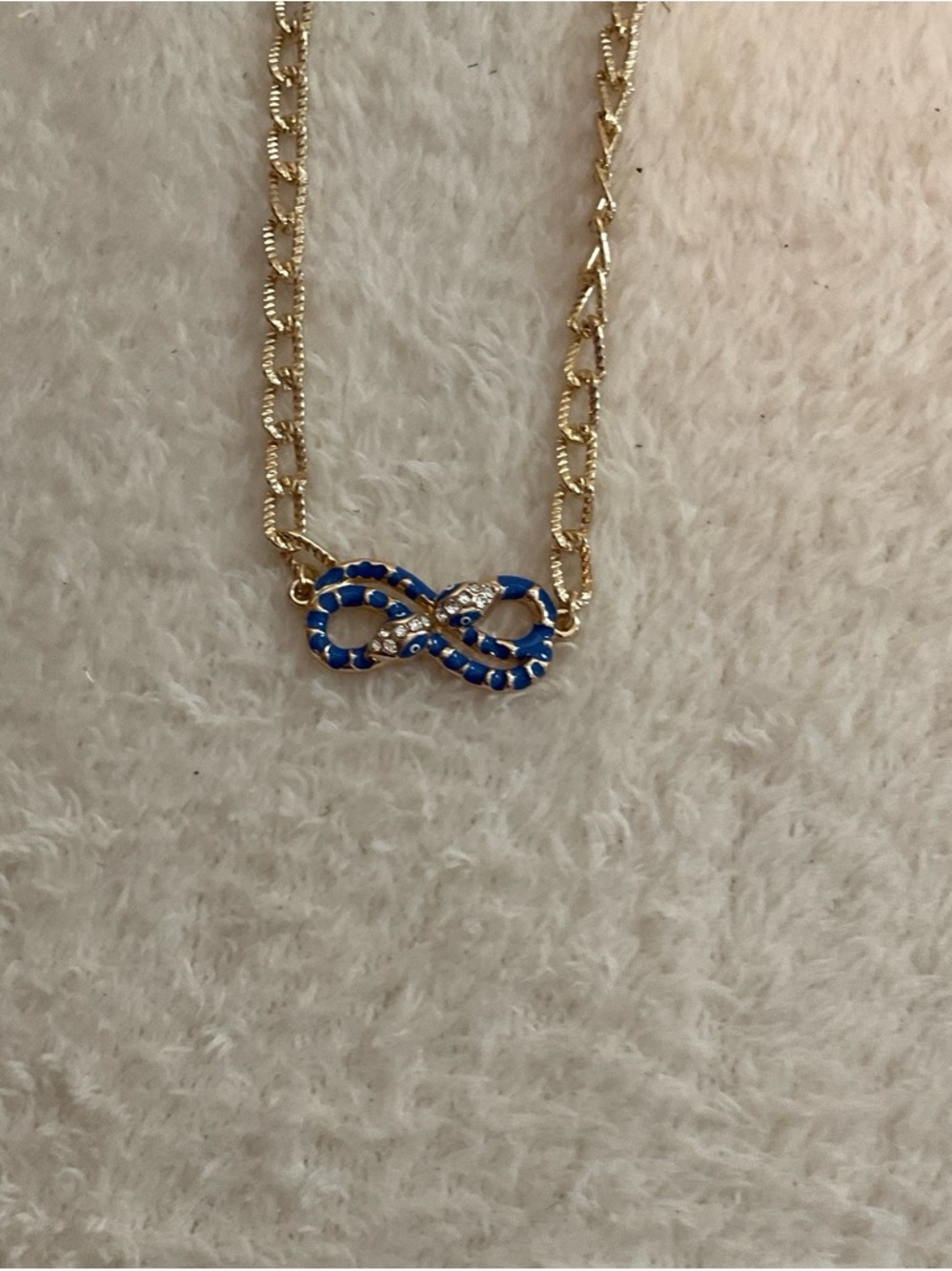 Jenni Gold-Tone Infinity Necklace with Blue Crystal Accents - Picture 4 of 5